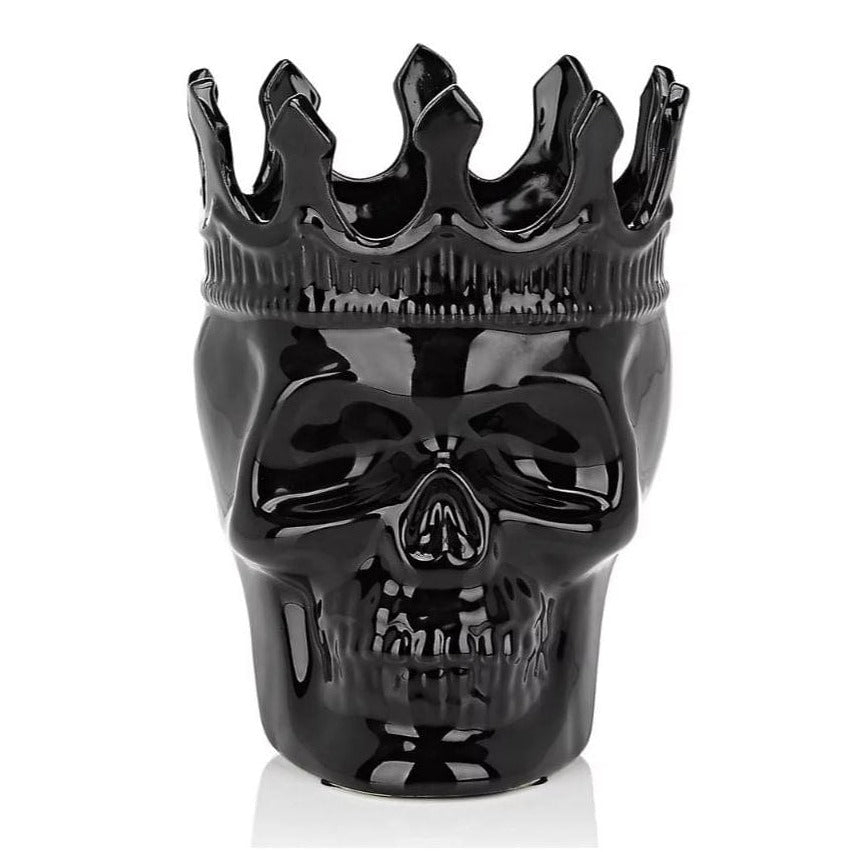 black skull candle with a crown