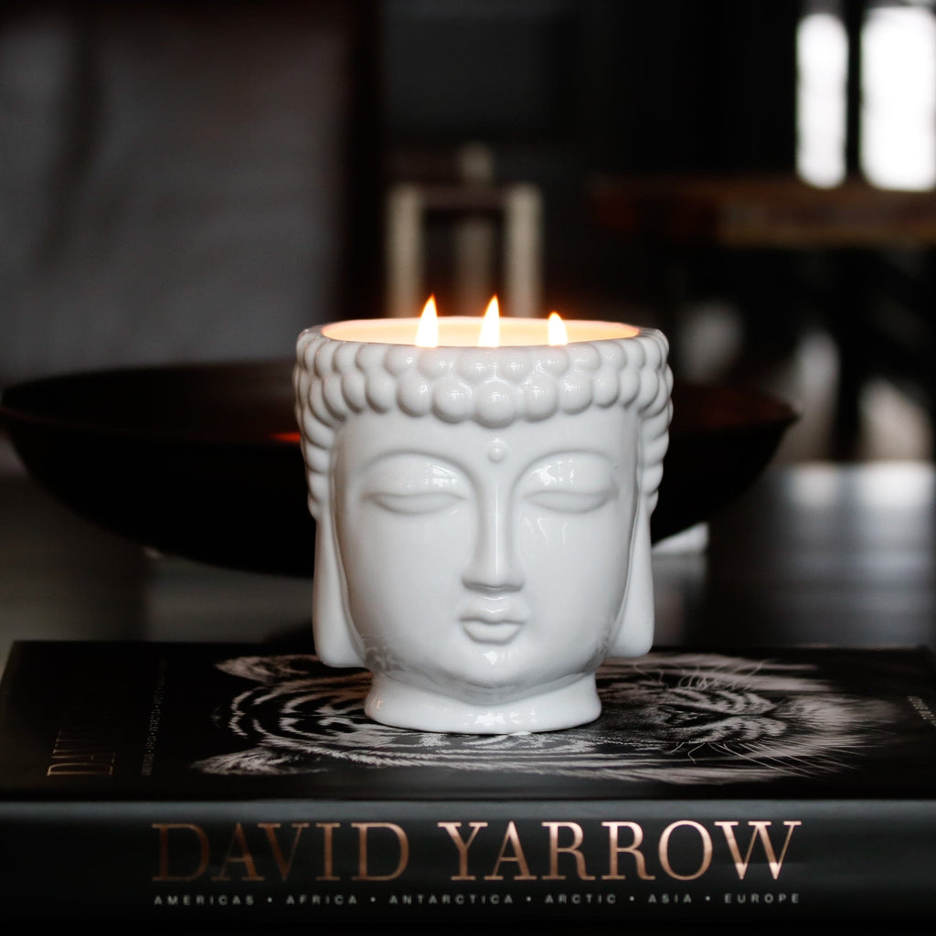 white buddha head candle with 3 cotton wicks