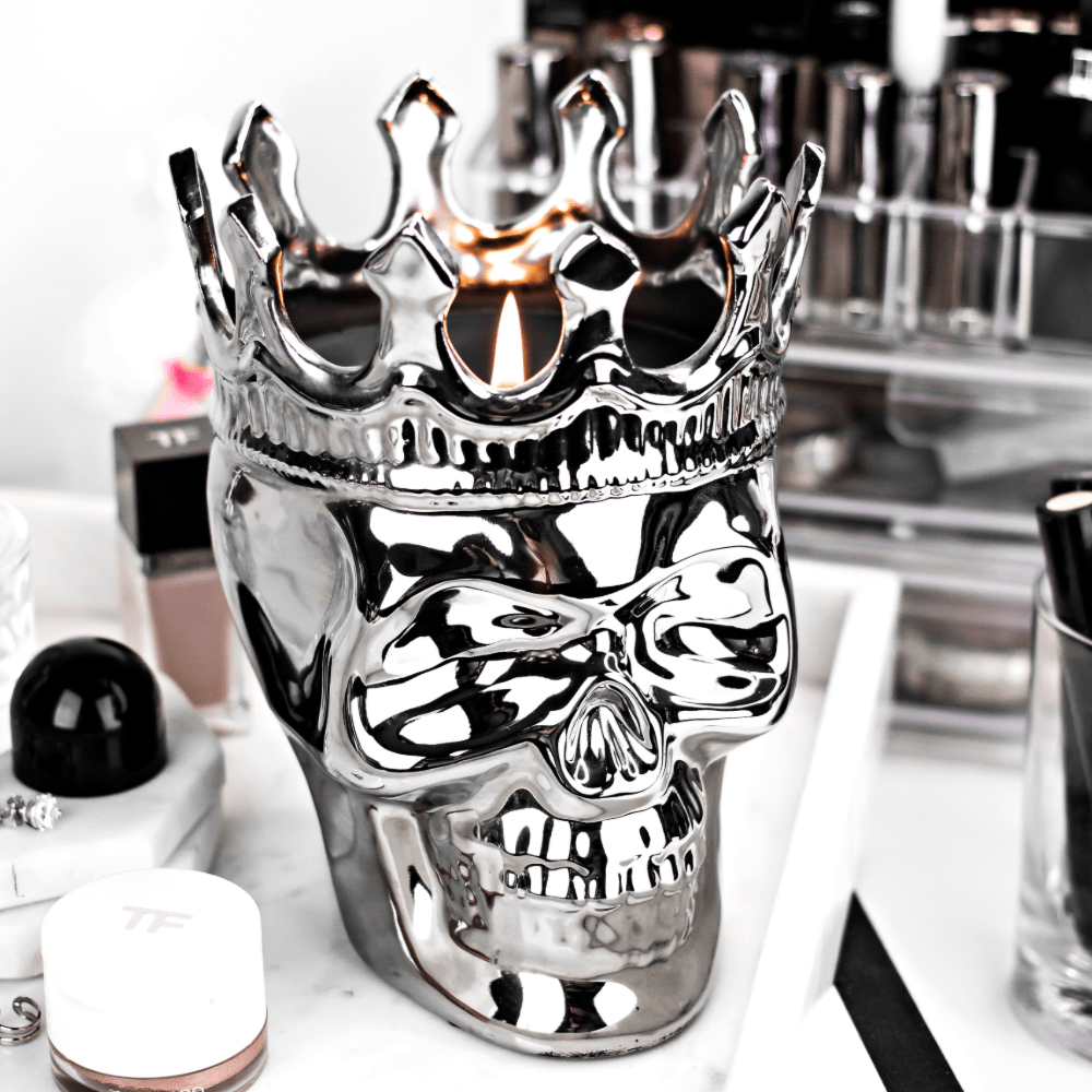 Thompson Ferrier silver skull candle with crown and black wax and 1 wick