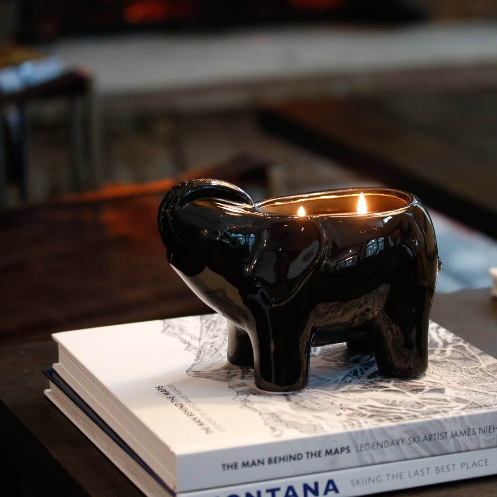 black elephant candle with the trunk up