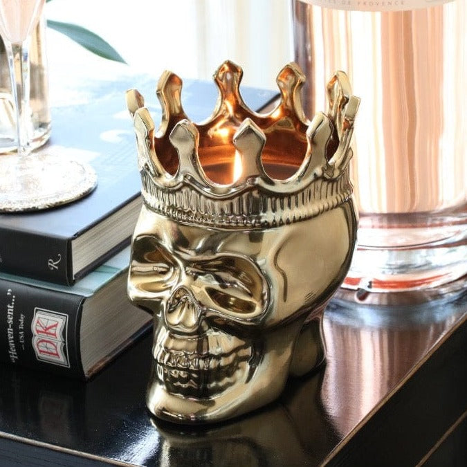 gold skull candle with a crown
