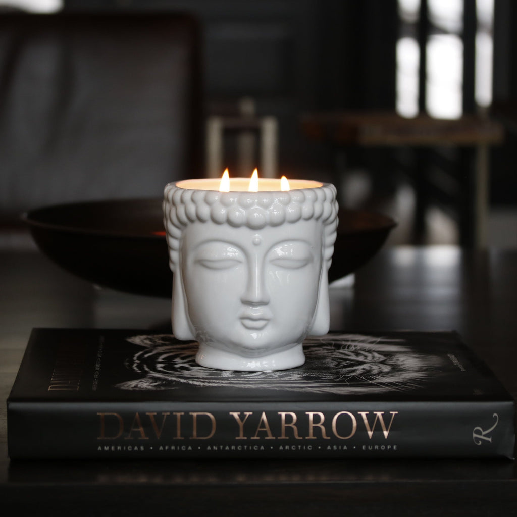 white buddha head candle 