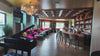 Sunset Theater lounge and bar in Westhampton Beach, with velvet booths and Art Deco chandelier