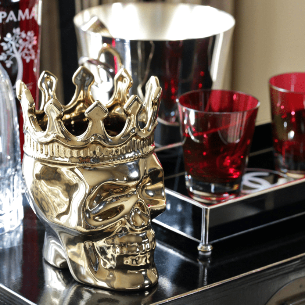 gold ceramic skull candle with crown and 1 cotton wick