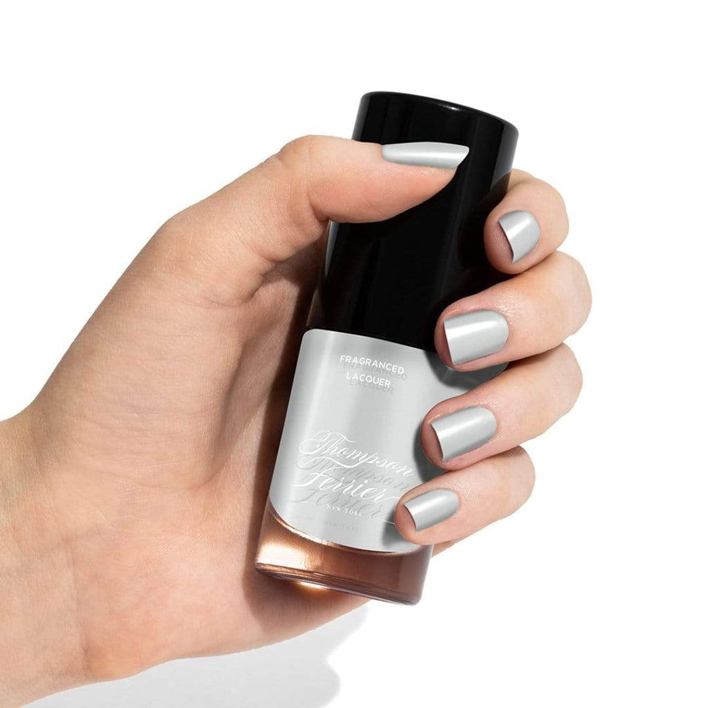 glass-nail-polish-bottle-with-silver-nail-polish