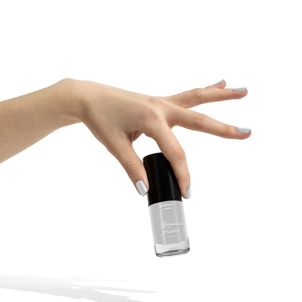 glass-nail-polish-bottle-with-silver-nail-polish