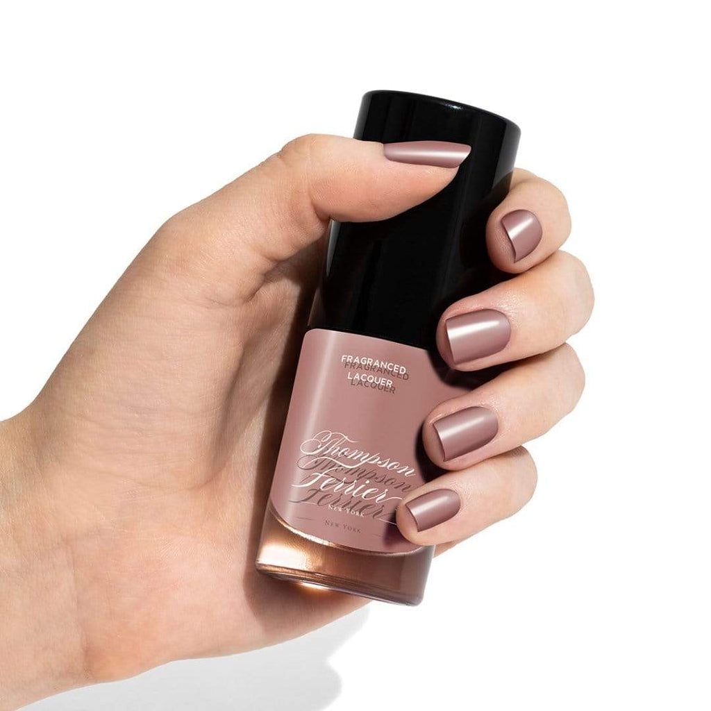 glass-nail-polish-bottle-with-pink-polish-inside