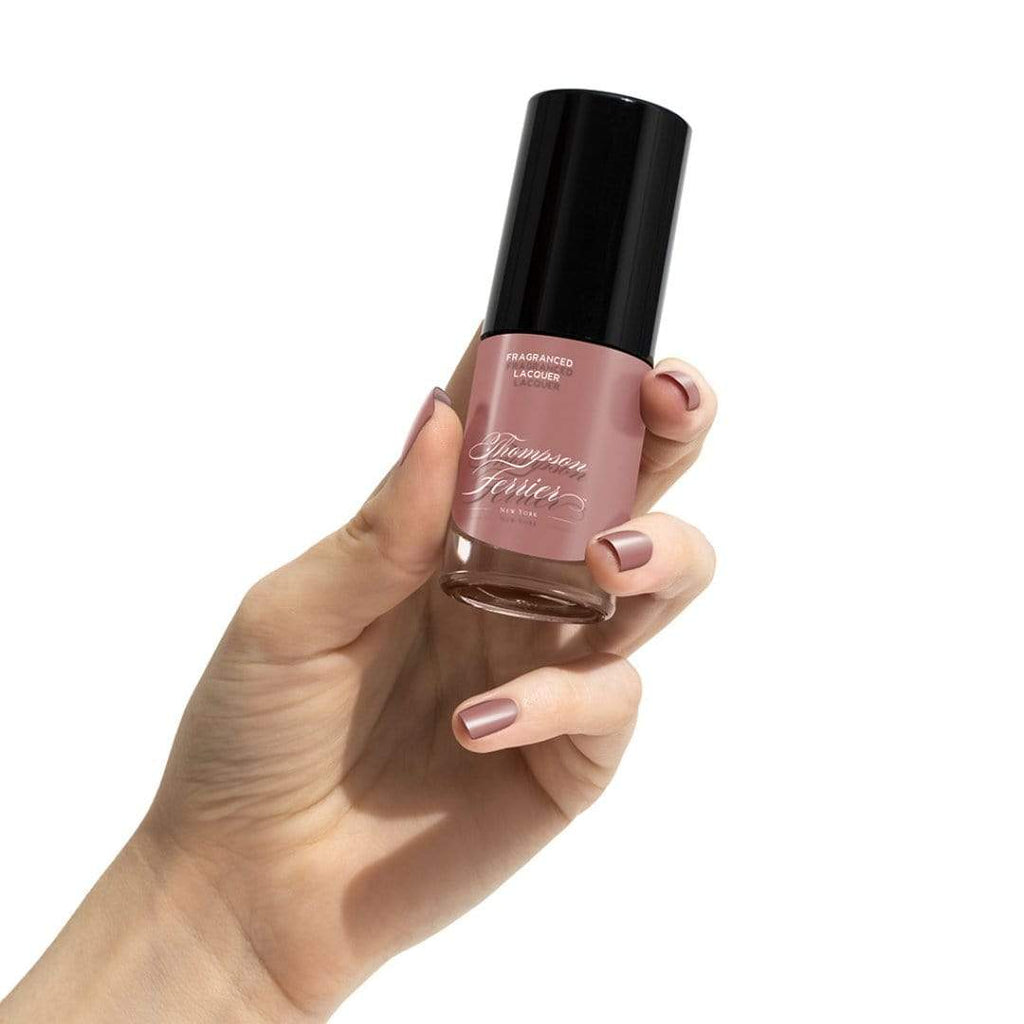 glass-nail-polish-bottle-with-pink-polish-inside