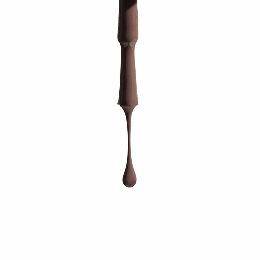 brown-nail-polish-dripping-from-brush