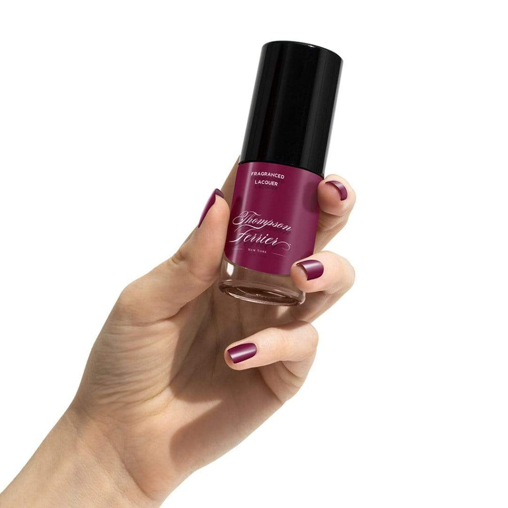 glass-nail-polish-bottle-with-plum-nail-polish