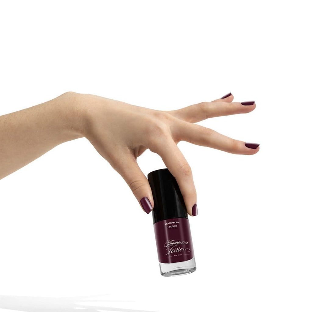 wine-colored-nail-polish-in-glass-bottle