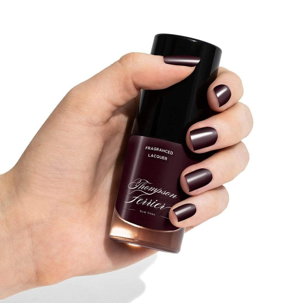 wine-colored-nail-polish-in-glass-bottle