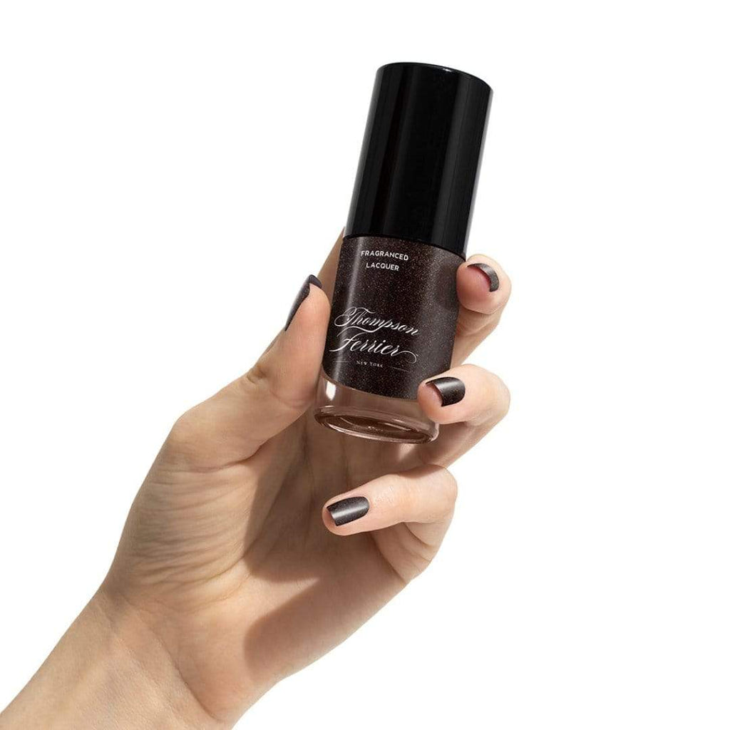 glass-nail-polish-bottle-with-shimmery-brown-polish