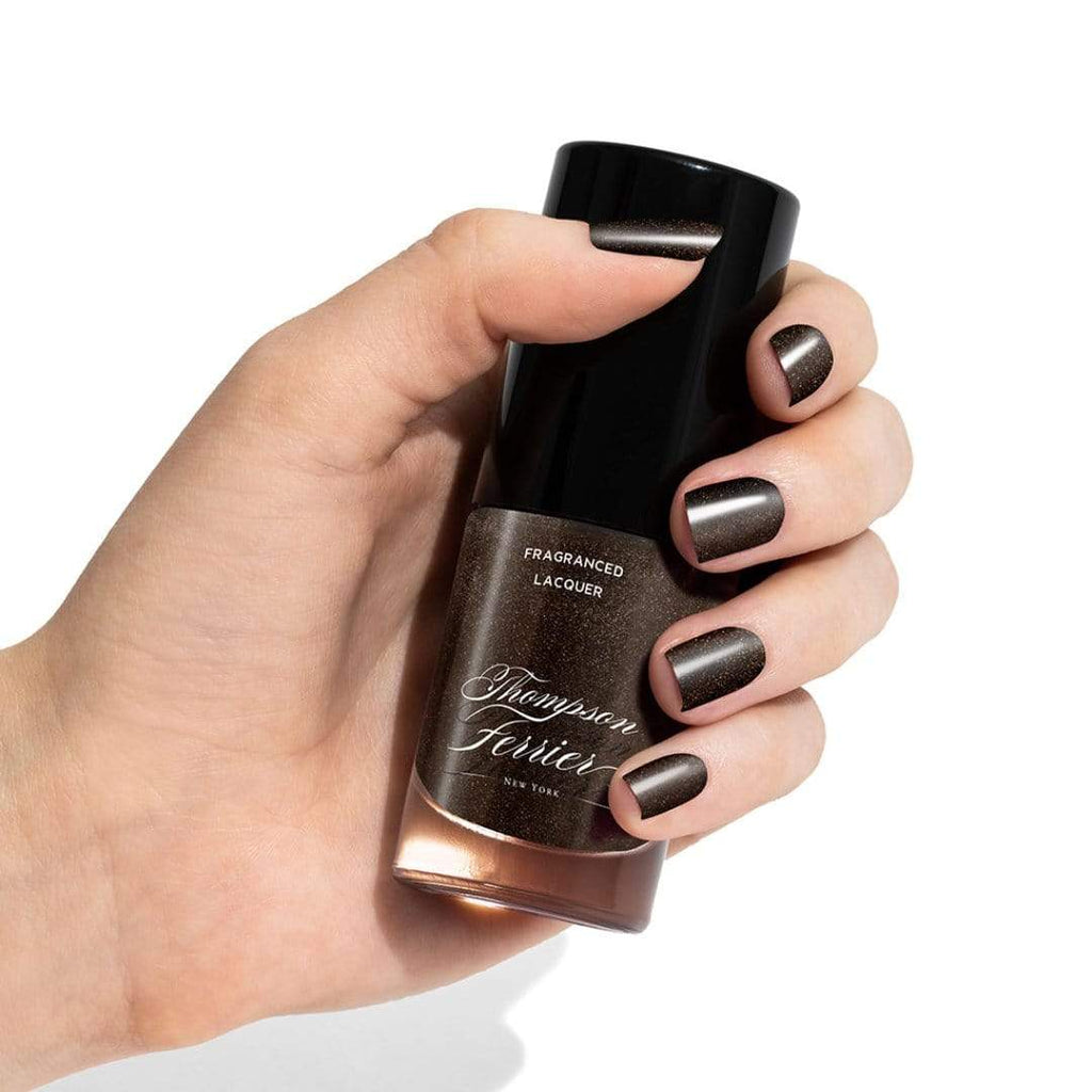 glass-nail-polish-bottle-with-shimmery-brown-polish