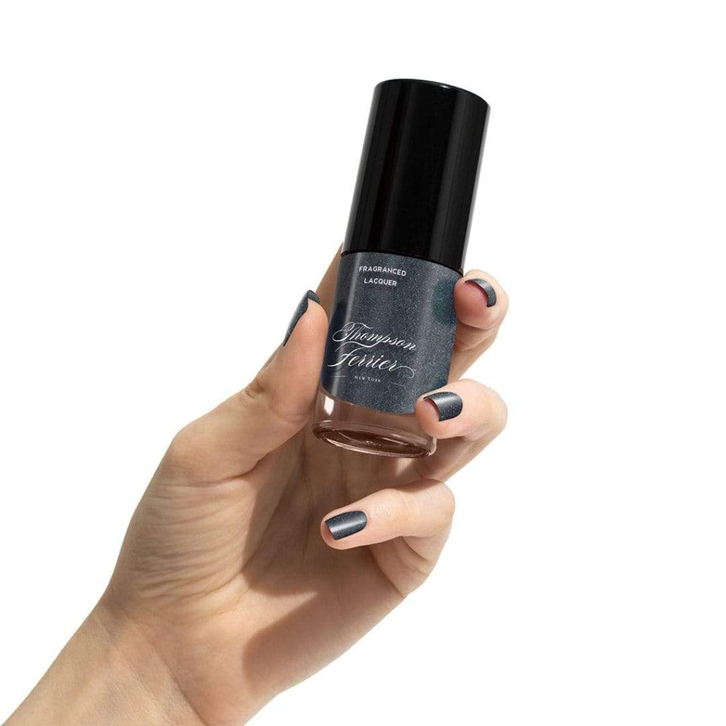 glass-nail-polish-bottle-with-silver-nail-polish