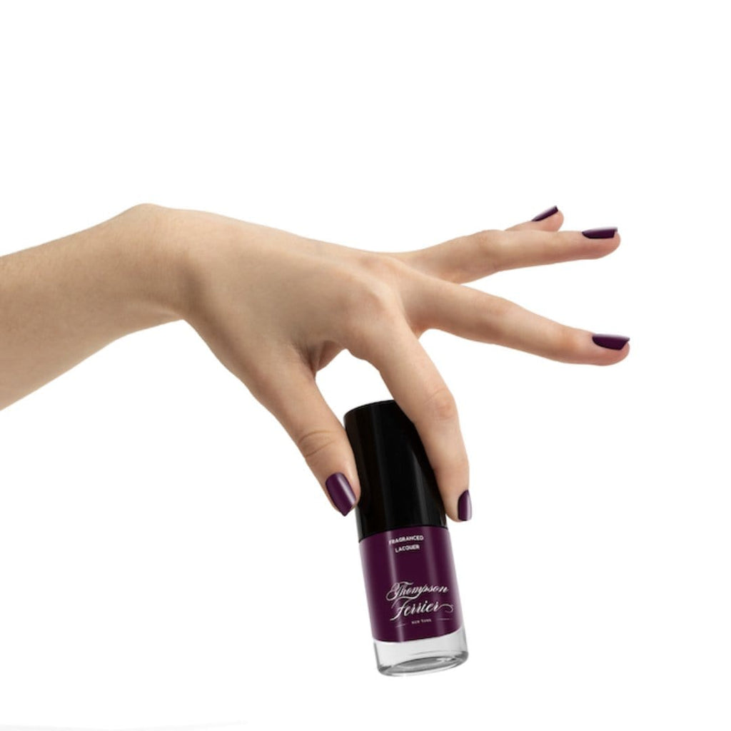 purple-nail-polish-in-glass-bottle