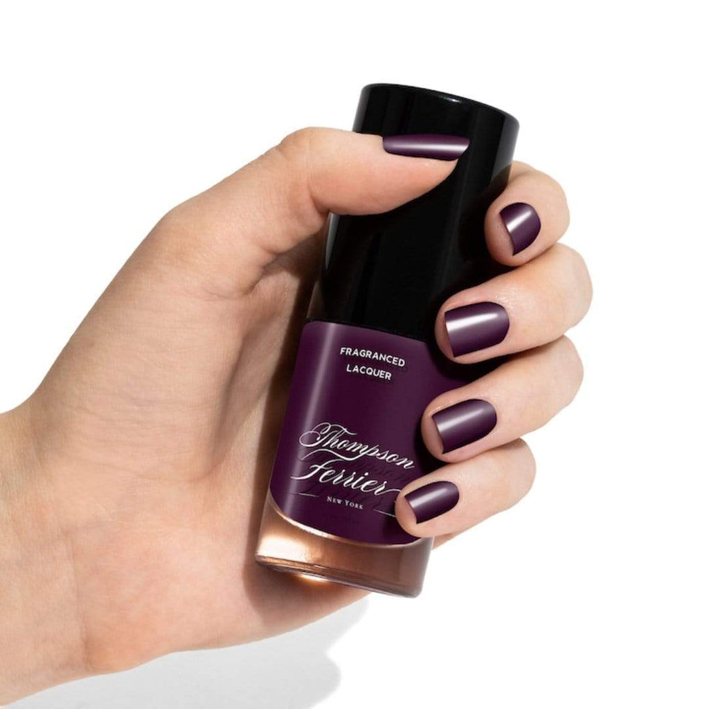 purple-nail-polish-in-glass-bottle