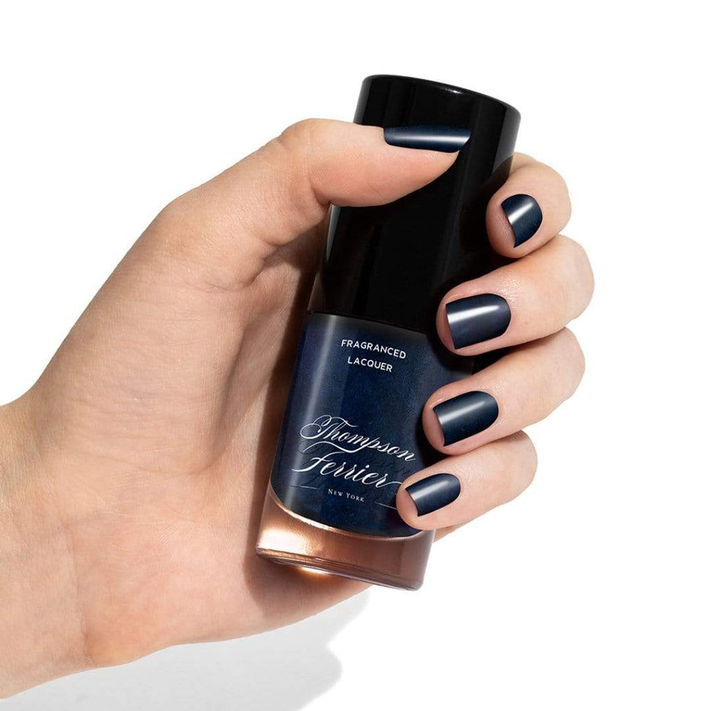 glass-nail-polish-bottle-with-blue-polish
