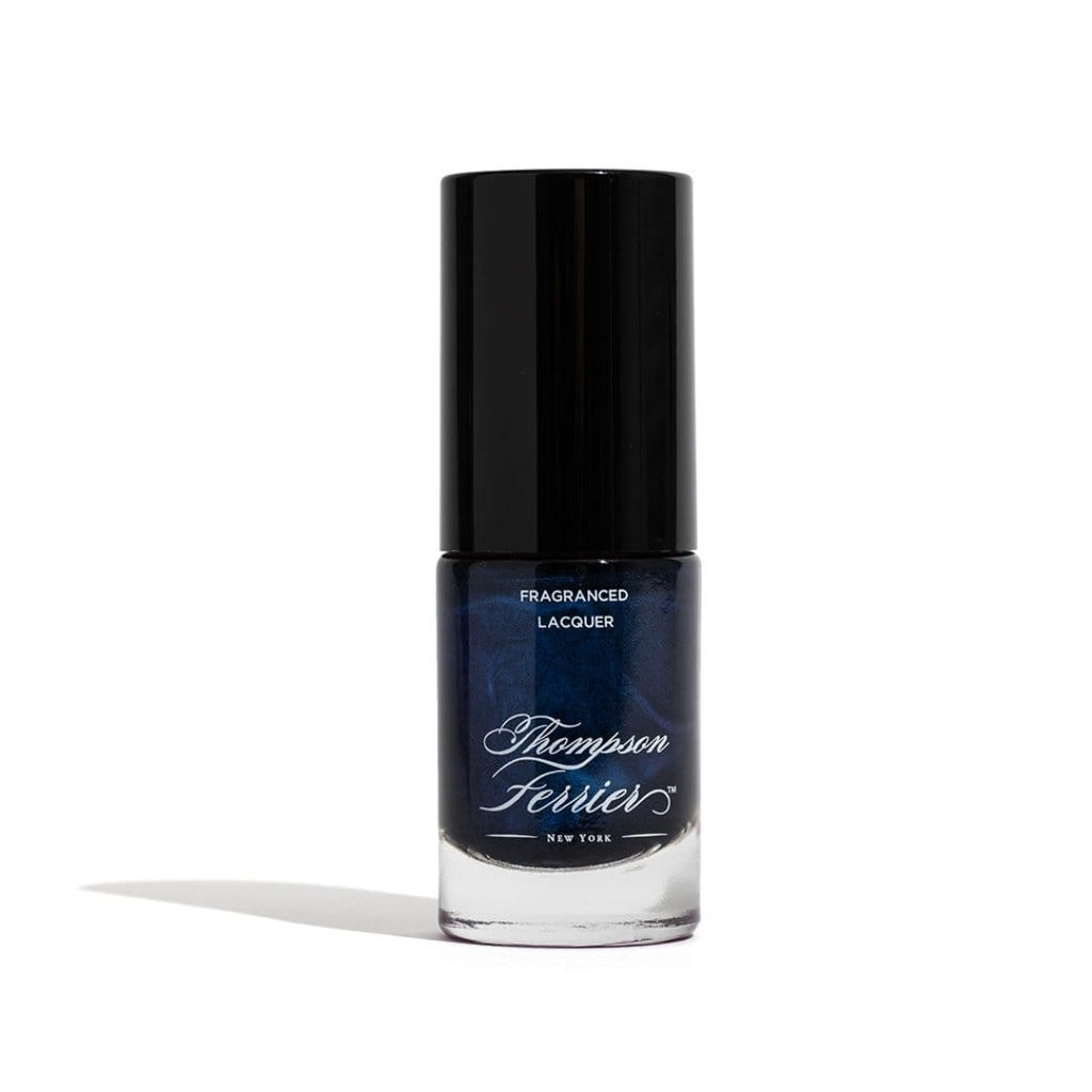 glass-nail-polish-bottle-with-blue-polish