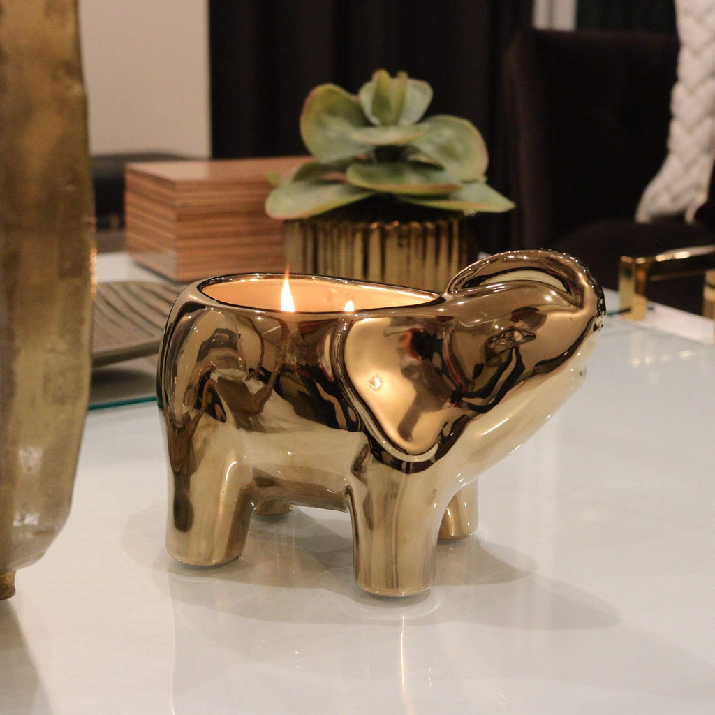 gold-ceramic-elephant-candle-with-2-lit-wicks
