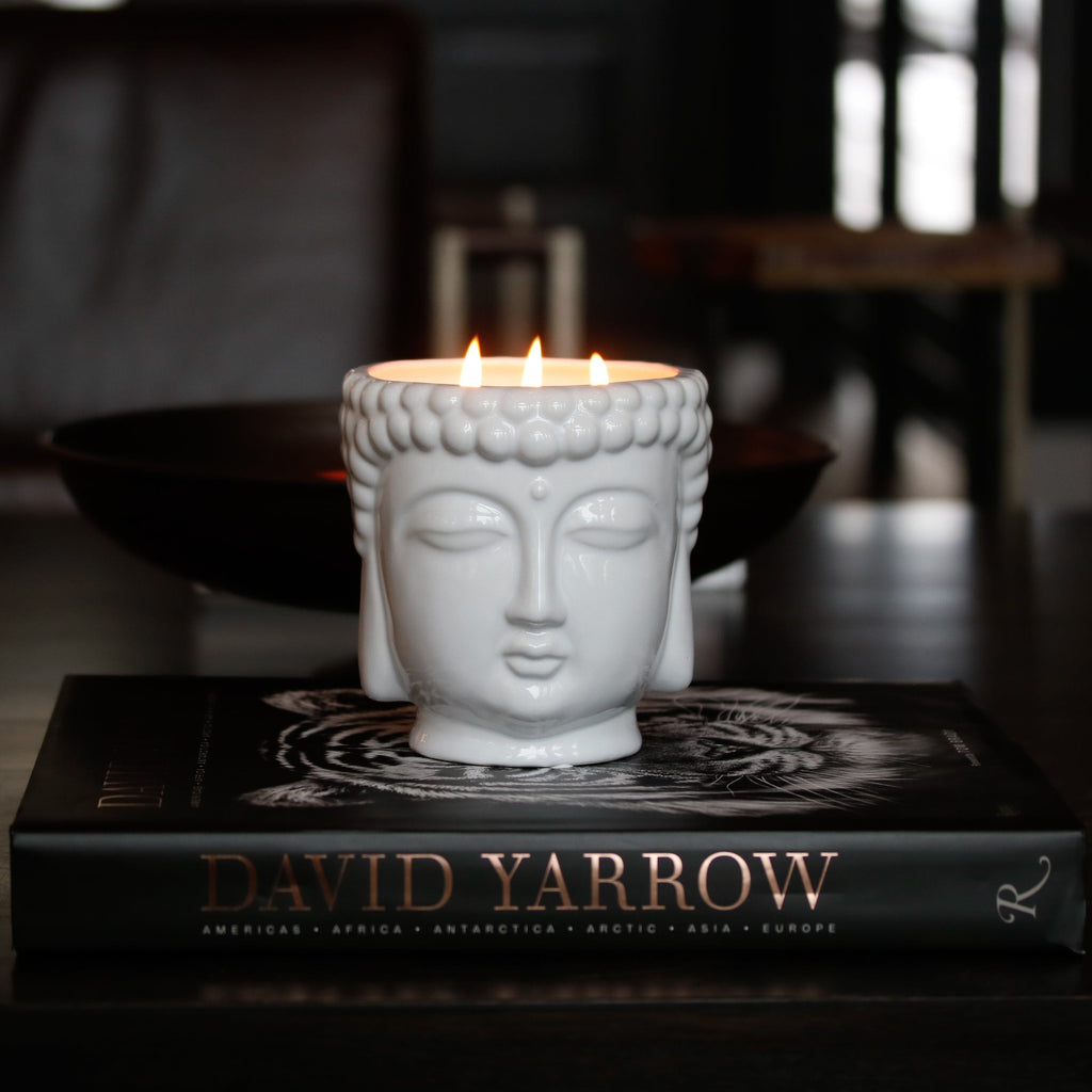 white buddha candle